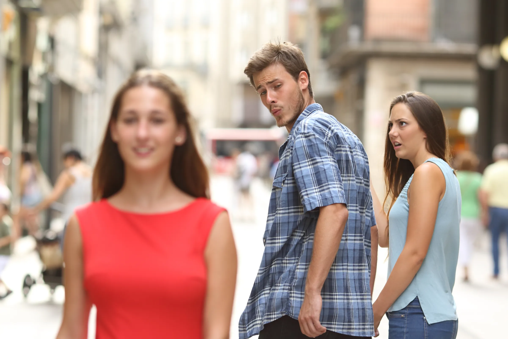 The meme with the guy looking at another woman